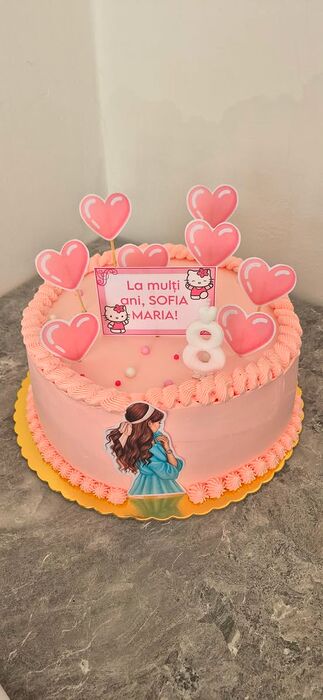 Tort roz cu Hello Kitty și baloane-inimă, pentru 8 ani